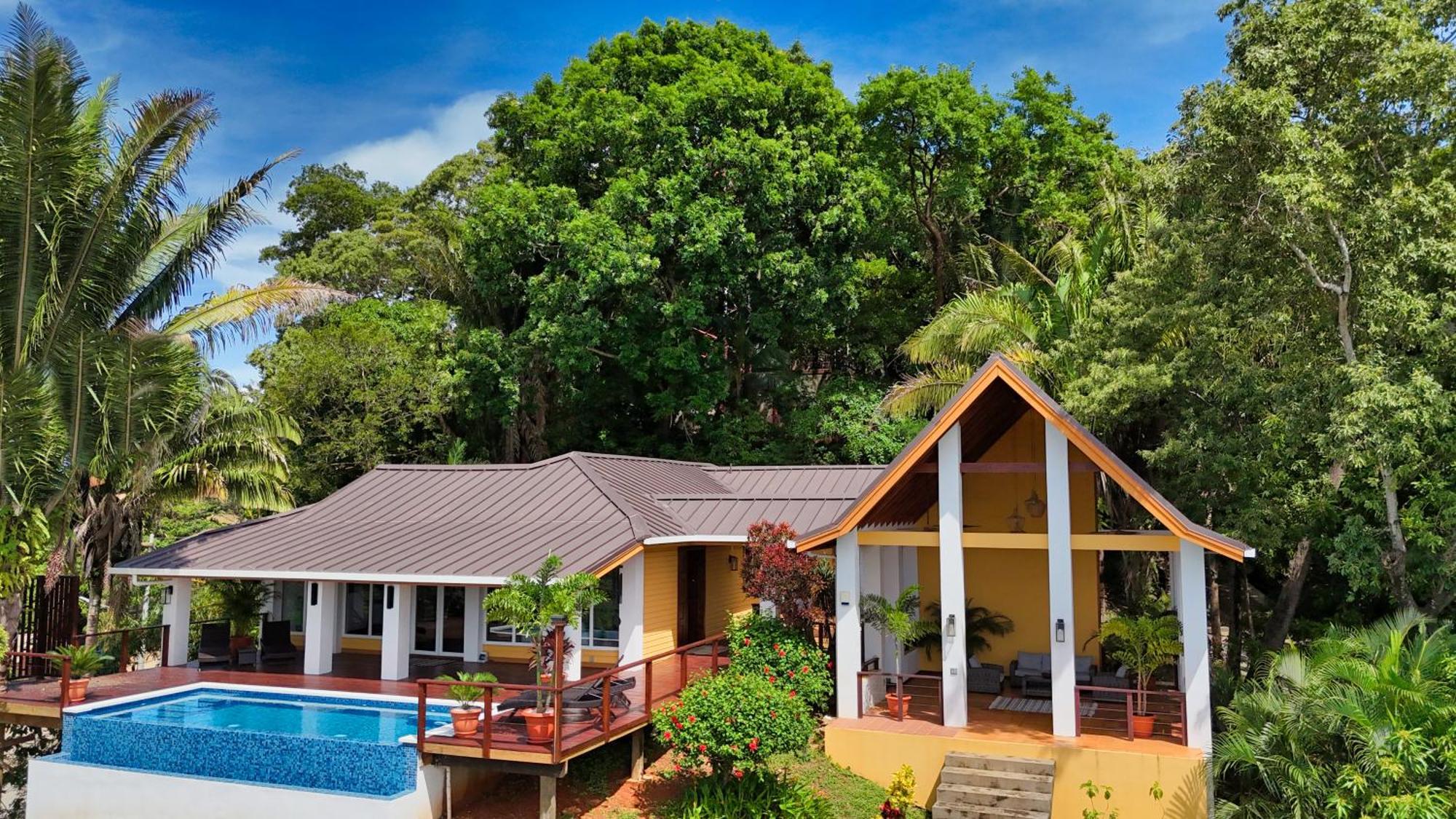 Relax At This Hillside Retreat That Overlooks The Lush Forest And The Caribbean, West End Exterior foto